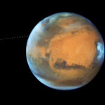 NASA’s Hubble Sees Martian Moon Orbiting the Red Planet